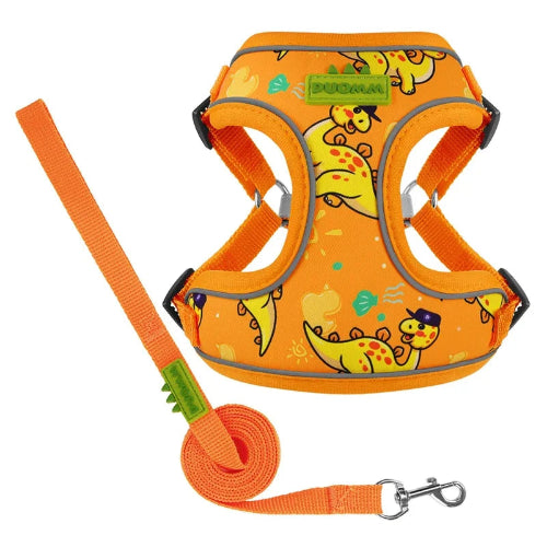Harnais orange avec motifs dinosaures pour chiens. Vendu avec sa Laisse assortie. Confortable, convient aux petits chiens, chihuahuas, ou aux chats. Vendu dans la boutique « Mon Petit Chihuahua »