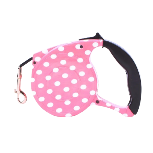 Laisse rétractable rose à points blancs pour chiens. Pratique, convient aux petits chiens, chihuahuas, ou aux chats. Vendu dans la boutique « Mon Petit Chihuahua »