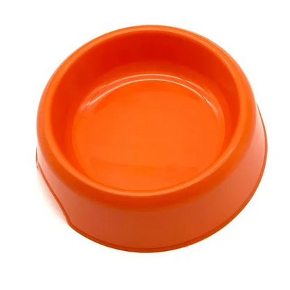 Gamelle simple en plastique résistant, couleur orange. Adaptée aux petits chiens et aux chats. Vendue sur la boutique Mon Petit Chihuahua. 