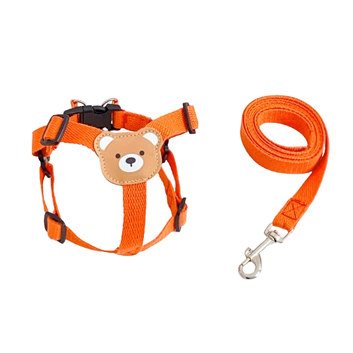 Harnais pour chiens fin orange avec nounours sur le dos. Vendu avec sa Laisse assortie. Confortable, convient aux petits chiens, chihuahuas, ou aux chats. Vendu dans la boutique « Mon Petit Chihuahua »