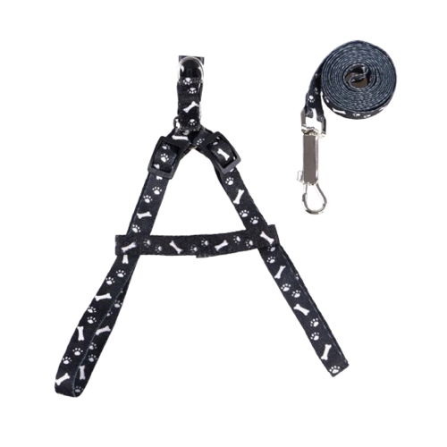 Harnais noir aux motifs os pour petit chien avec sa laisse assortie. Confortable, convient aux petits chiens, chihuahuas, ou aux chats.