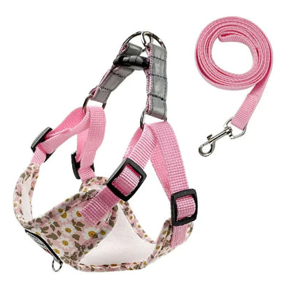 Harnais rose avec motifs fleurs Pâquerettes et sa laisse assortie pour petit chien. Réglable et confortable, convient aux petits chiens, chihuahuas, ou aux chats.