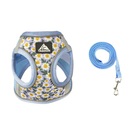 Harnais bleu résistant avec motifs pâquerettes pour chiens. Vendu avec avec sa laisse assortie. Confortable, convient aux petits chiens, chihuahuas, ou aux chats.