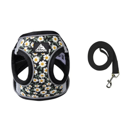 Harnais noir résistant avec motifs pâquerettes pour chiens. Vendu avec avec sa laisse assortie. Confortable, convient aux petits chiens, chihuahuas, ou aux chats.